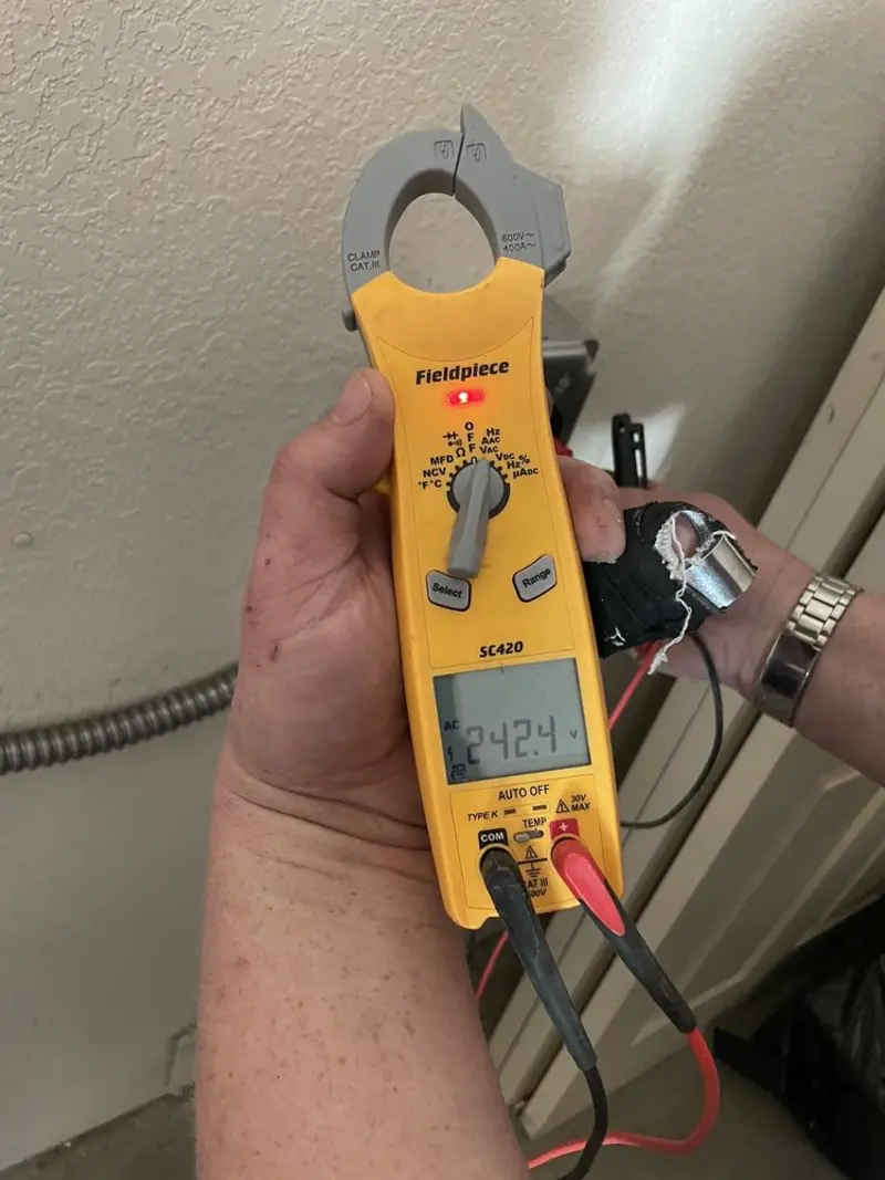 Voltage testing with clamp meter during Aluminum Wiring Replacement in Richland